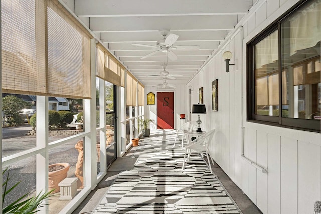 sunroom / solarium with ceiling fan