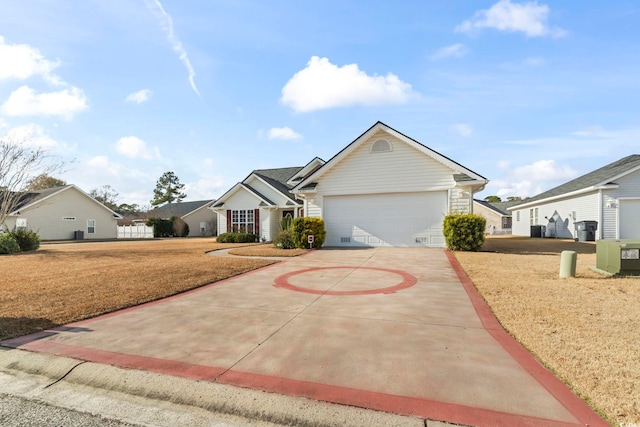 ranch-style house with a garage and a front lawn