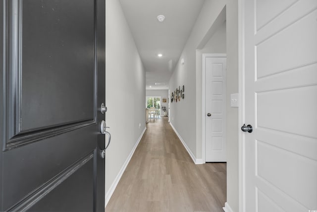 hallway featuring light hardwood / wood-style floors