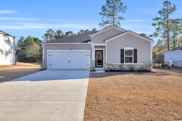 view of front of property featuring a garage