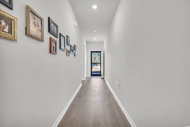 hallway featuring wood-type flooring