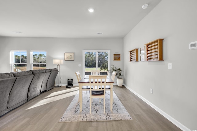 dining space featuring light hardwood / wood-style flooring