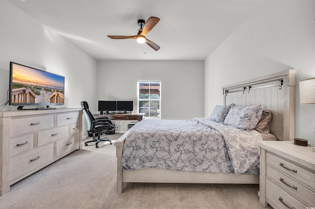 carpeted bedroom featuring ceiling fan