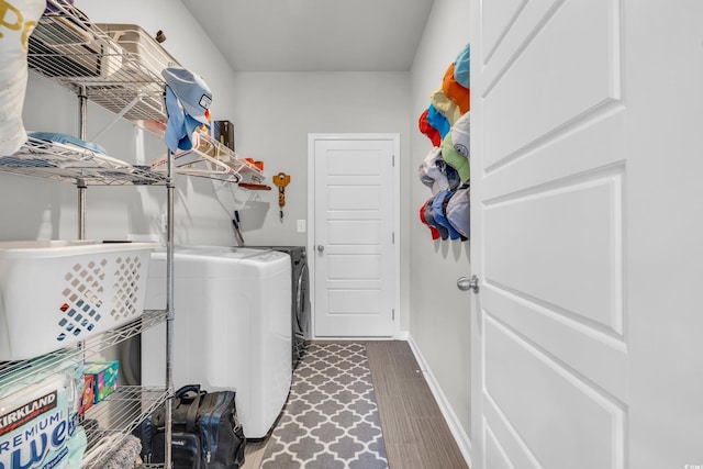 washroom featuring washing machine and clothes dryer