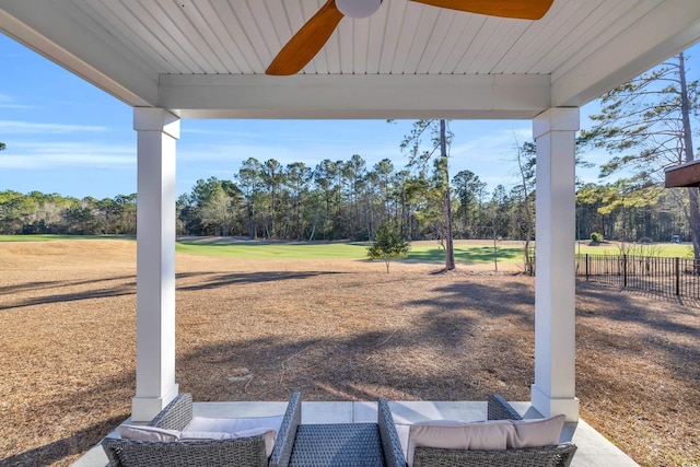 view of yard featuring ceiling fan