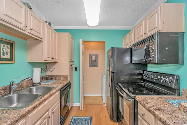 kitchen featuring sink, light hardwood / wood-style flooring, electric panel, black appliances, and a textured ceiling