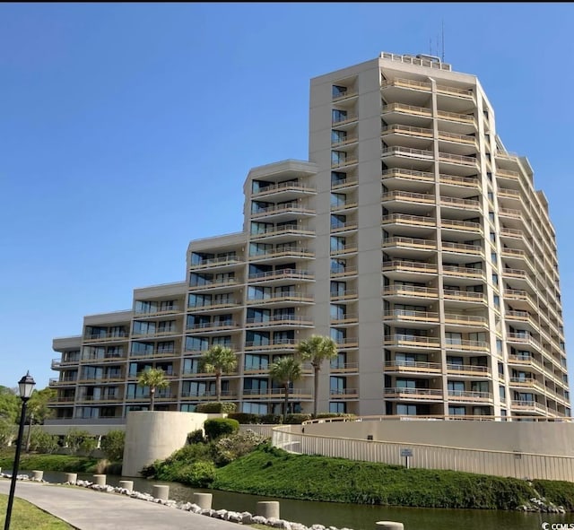 view of property with a water view