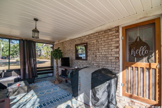 view of patio featuring covered porch and area for grilling