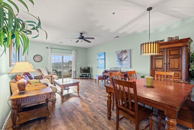 2080 Cross Gate Blvd Unit 303, Surfside Beach, SC 29575 - dining room featuring wood finished floors, a ceiling fan, and baseboards