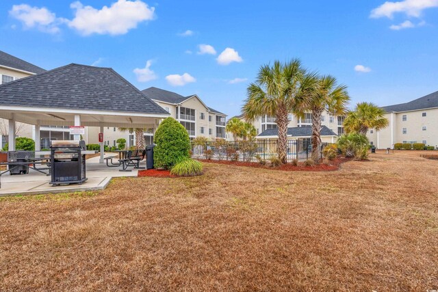 2080 Cross Gate Blvd Unit 303, Surfside Beach, SC 29575 - view of yard featuring a gazebo, a patio, and a residential view
