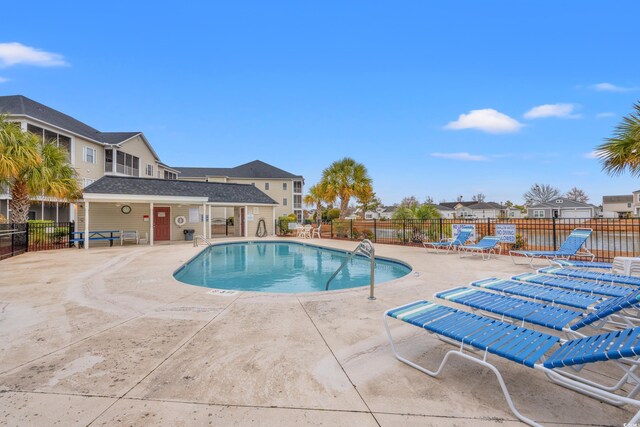 2080 Cross Gate Blvd Unit 303, Surfside Beach, SC 29575 - community pool with a patio