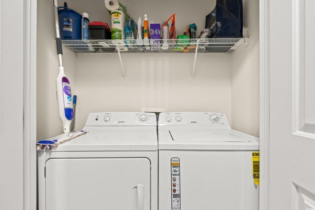 2080 Cross Gate Blvd Unit 303, Surfside Beach, SC 29575 - washroom with washer and clothes dryer