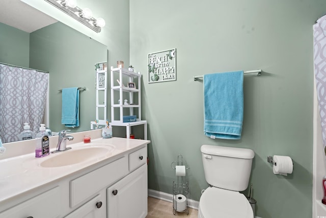 2080 Cross Gate Blvd Unit 303, Surfside Beach, SC 29575 - bathroom featuring vanity, toilet, baseboards, and a shower with shower curtain