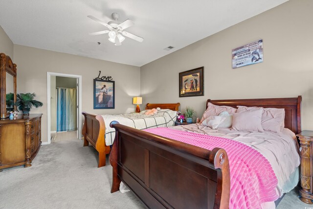 2080 Cross Gate Blvd Unit 303, Surfside Beach, SC 29575 - bedroom with light colored carpet, ceiling fan, and baseboards