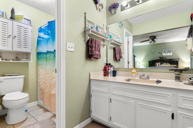 bathroom featuring vanity, ceiling fan, walk in shower, toilet, and tile patterned floors