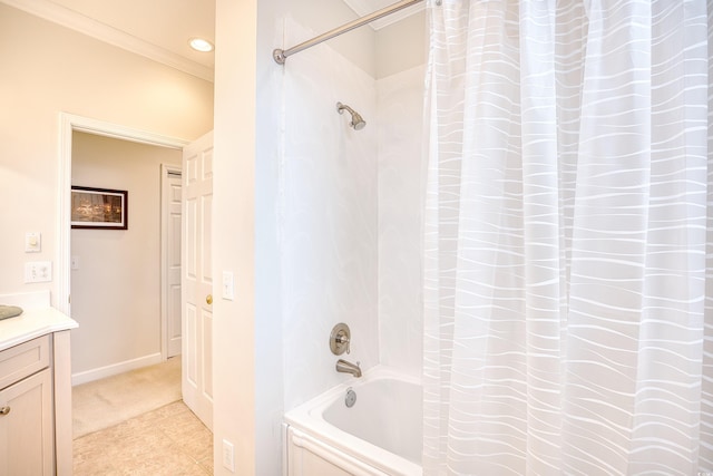 bathroom featuring shower / bath combo, vanity, and crown molding