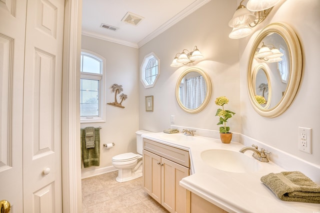 bathroom featuring vanity, toilet, and crown molding