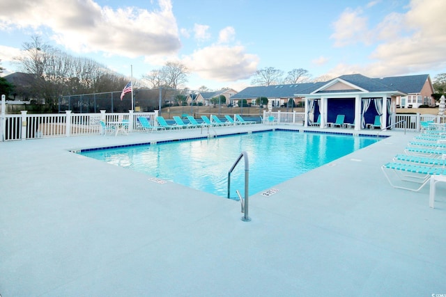 view of swimming pool with a patio area