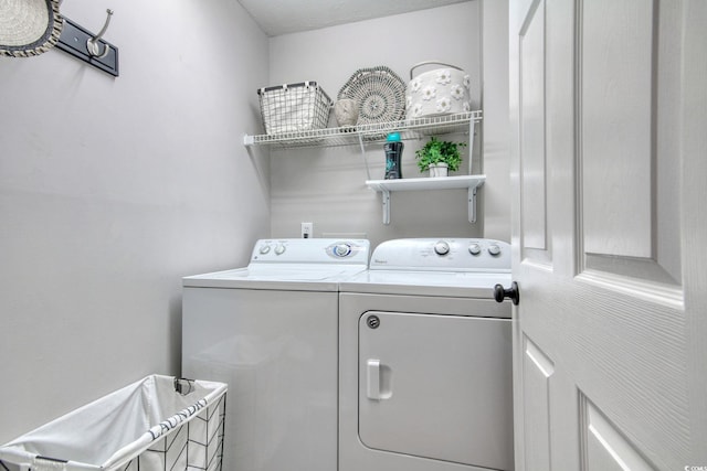 laundry area featuring independent washer and dryer