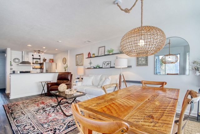 dining room featuring wood-type flooring