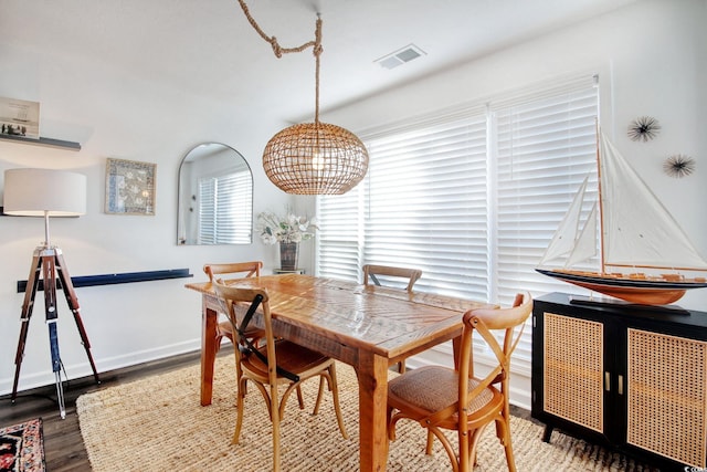 dining room with hardwood / wood-style floors