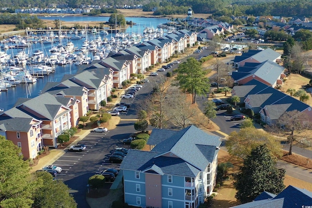 bird's eye view with a water view