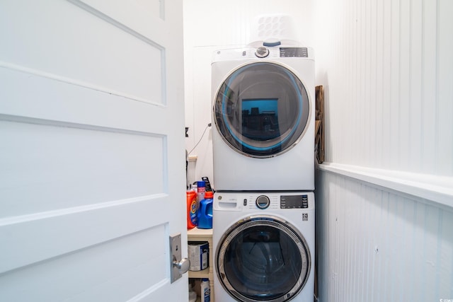 washroom with stacked washer and clothes dryer