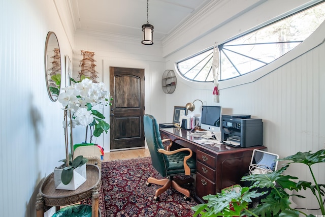 office area with ornamental molding and hardwood / wood-style flooring