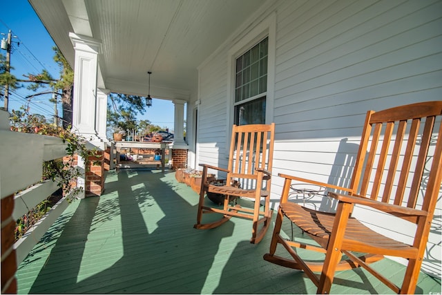 deck featuring covered porch