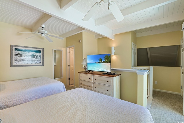 bedroom with beamed ceiling, ceiling fan, and carpet