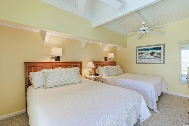 bedroom featuring ceiling fan, lofted ceiling with beams, and light colored carpet