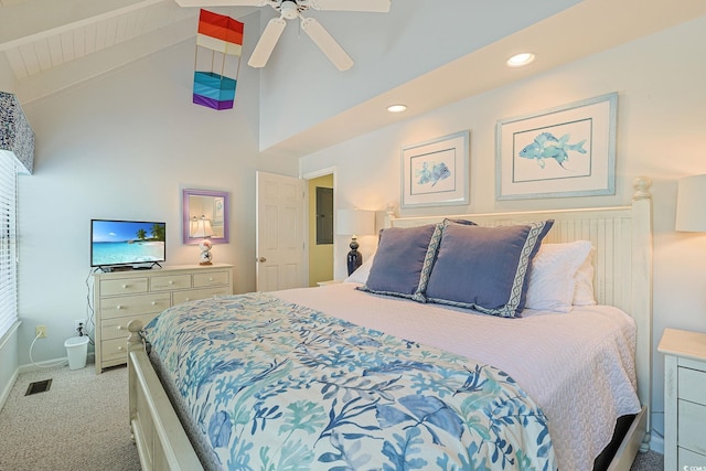 carpeted bedroom featuring ceiling fan, electric panel, high vaulted ceiling, and multiple windows