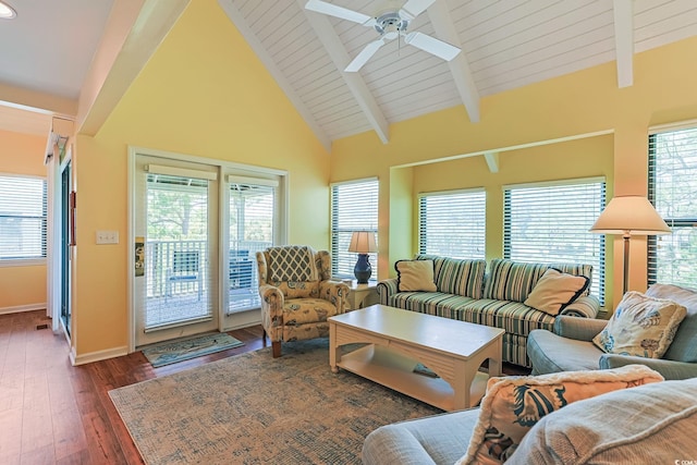 living room with vaulted ceiling with beams, ceiling fan, dark hardwood / wood-style flooring, and wooden ceiling