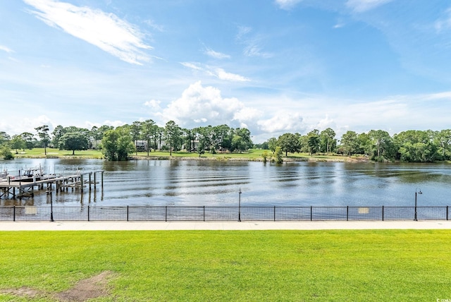 view of water feature with fence