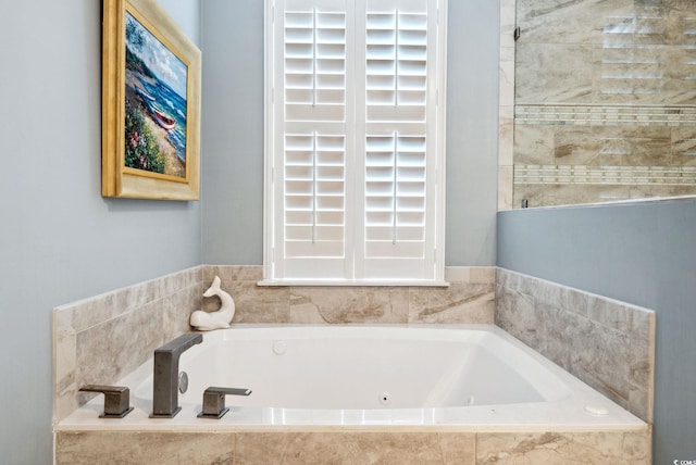 full bathroom featuring a whirlpool tub