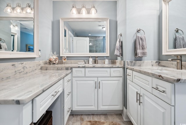 bathroom featuring vanity and walk in shower