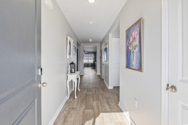 hall featuring light wood-type flooring