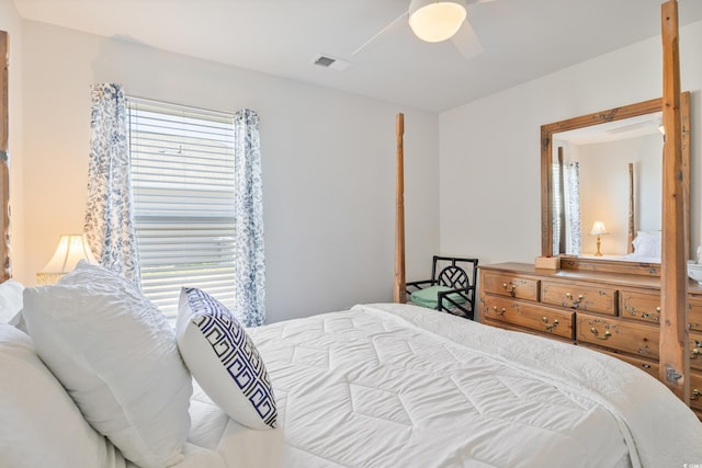 124 Golden Bear Cir, Longs, SC 29568 - bedroom with ceiling fan and multiple windows