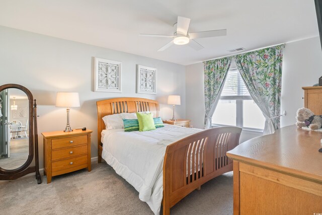 124 Golden Bear Cir, Longs, SC 29568 - bedroom with ceiling fan and light carpet