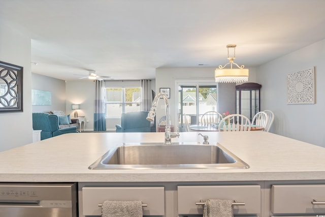 124 Golden Bear Cir, Longs, SC 29568 - kitchen featuring hanging light fixtures, ceiling fan, sink, and stainless steel dishwasher