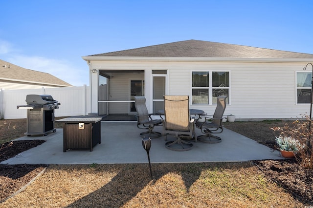 124 Golden Bear Cir, Longs, SC 29568 - back of house with a sunroom and a patio