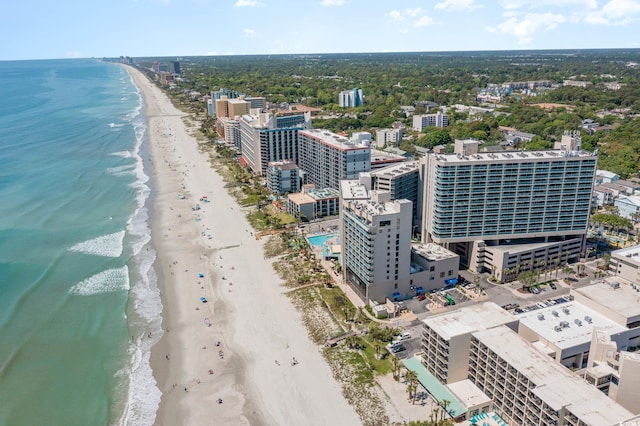 aerial view with a water view and a view of the beach