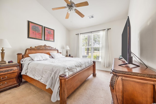 carpeted bedroom with ceiling fan and lofted ceiling