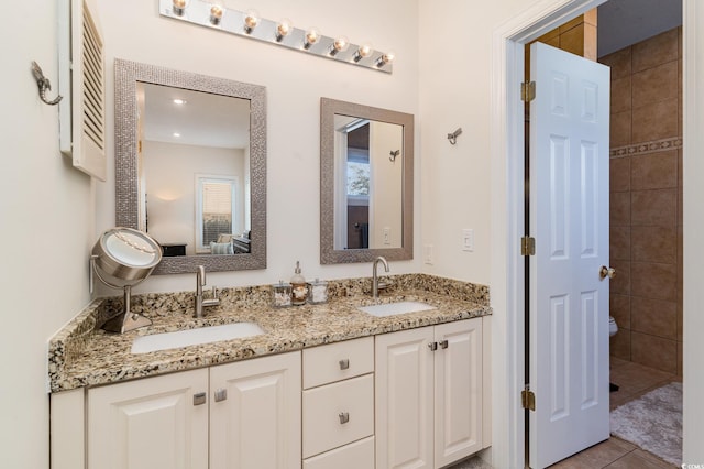 bathroom featuring vanity and tile patterned floors