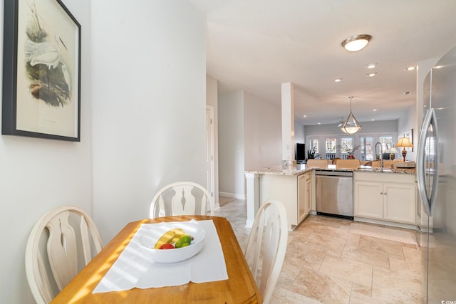 dining room with sink