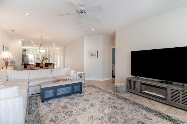 living room with ceiling fan