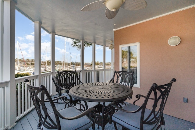 sunroom / solarium with ceiling fan