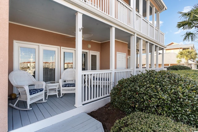 exterior space featuring ceiling fan