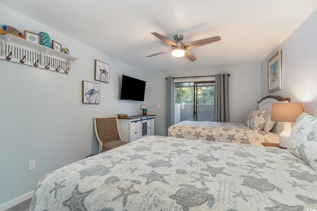 bedroom featuring access to outside, ceiling fan, and carpet floors