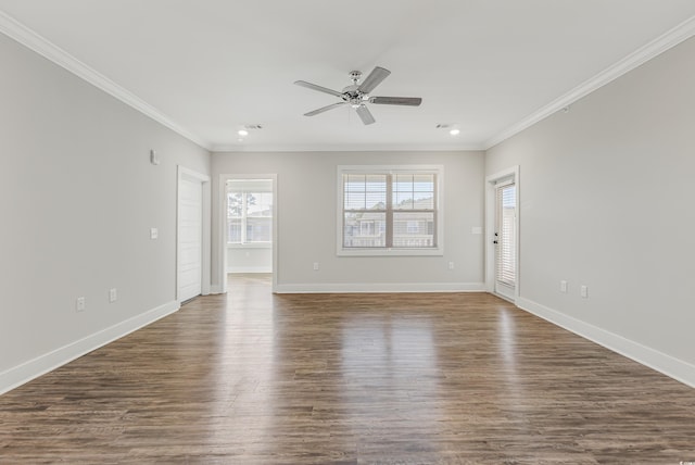 spare room with ceiling fan, dark hardwood / wood-style flooring, and ornamental molding